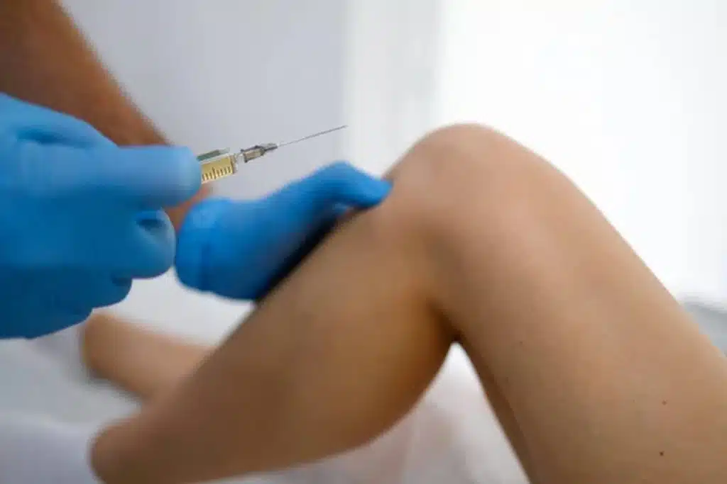 bmac injection wellington florida close view doctor hands syringe