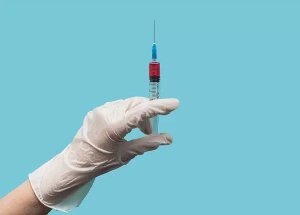 platelet-rich plasma therapy florida holding a syringe