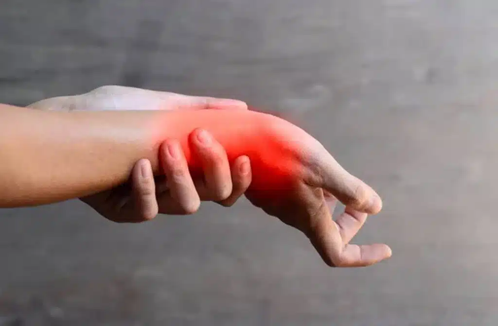 inflammation-asian-young-man-wrist-need-tendonitis-treatment-wellington-florida 1